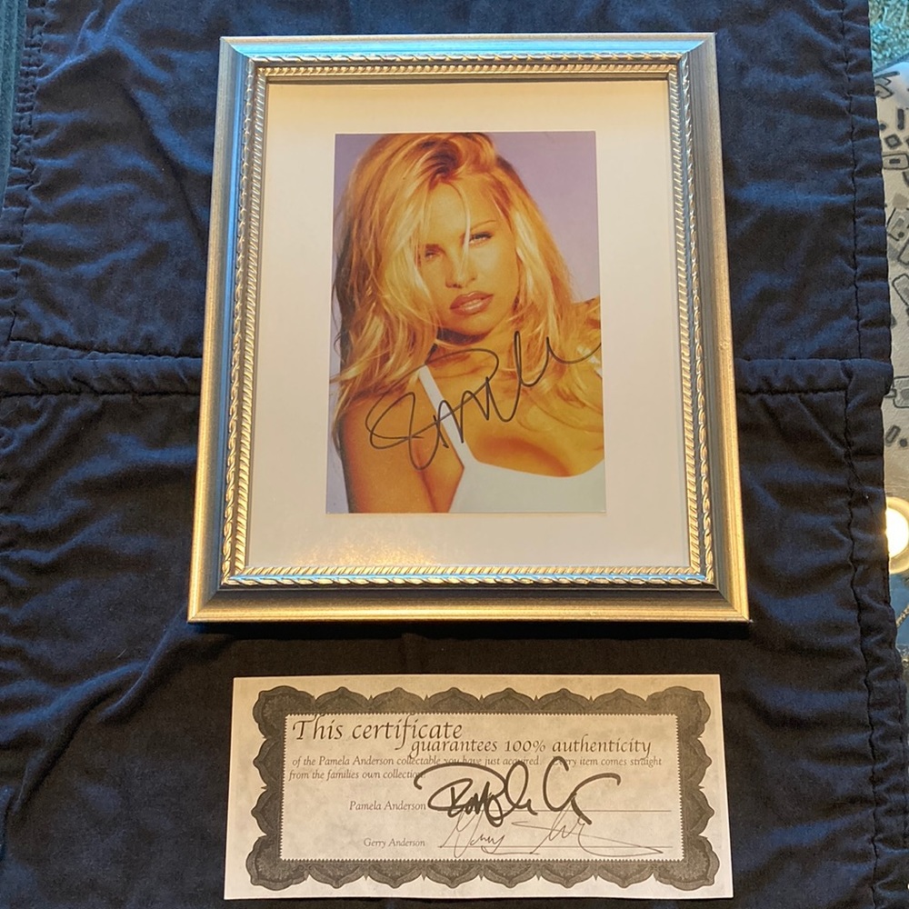 Pamela Anderson autographed framed 5x7 photo. Comes with COA
